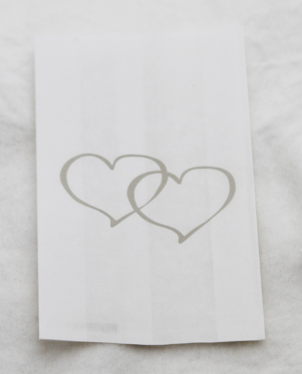 V382-CAKEBAG200SILHRT-202503040841-00 200 Pack Wedding Cake Bags Greaseproof Wax Paper Slice Take Home Favour Large Silver Heart - Image 1