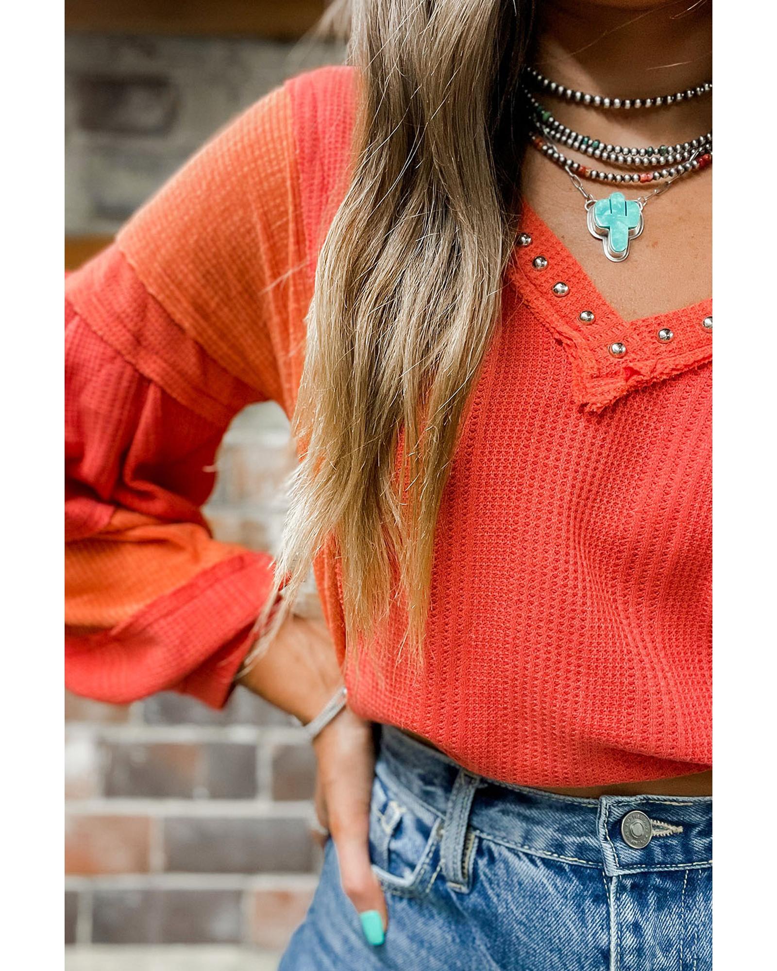 V539-AZEXDC25122797-3-XL-202508271525-00 Red Studded V Neckline Exposed Seam Textured Knit Top - XL - Image 1