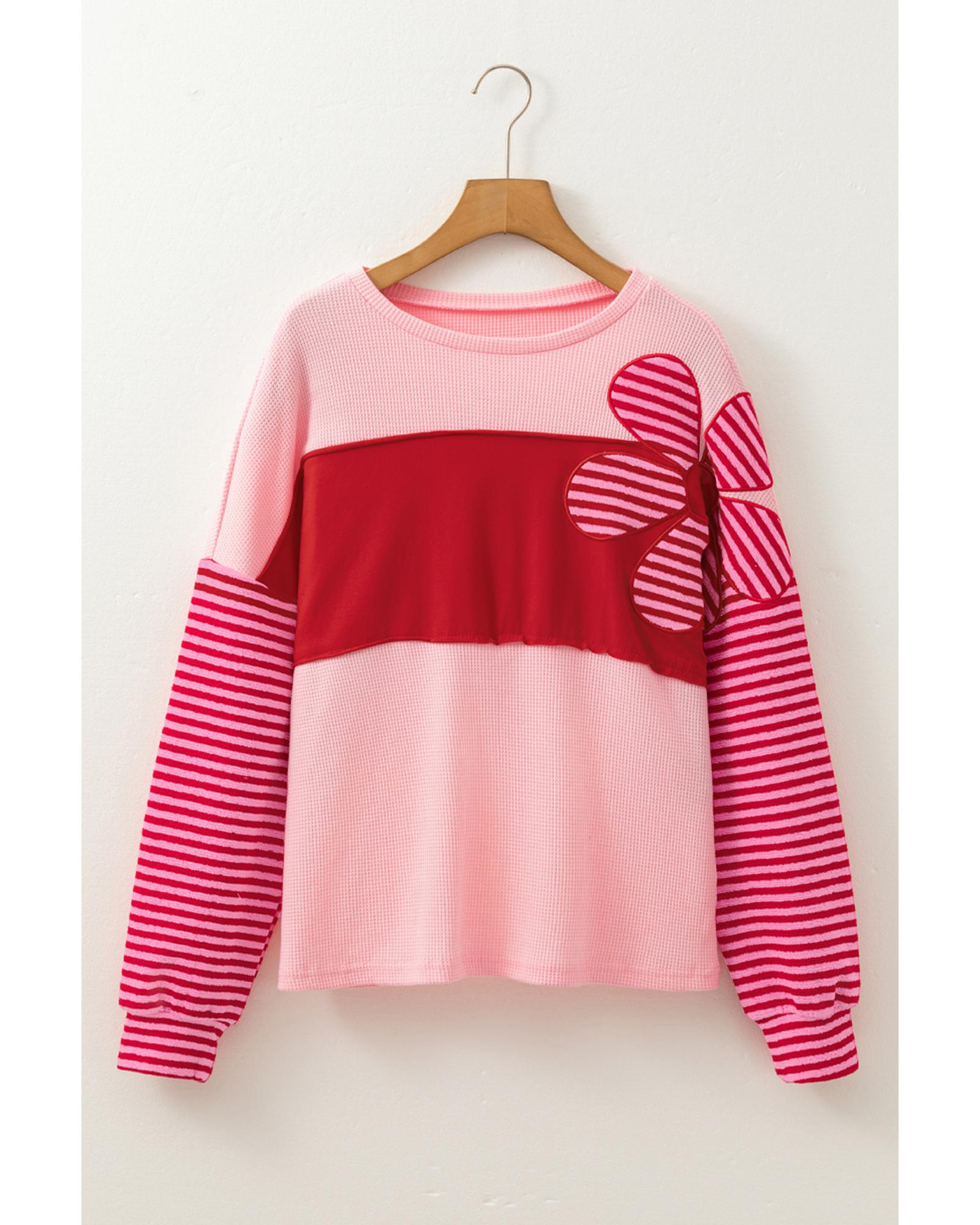 V539-AZEXDC25129506-P10-S-202506120522-00 Pink Floral Patch Color Block Striped Sleeve Textured Top - S - Image 1