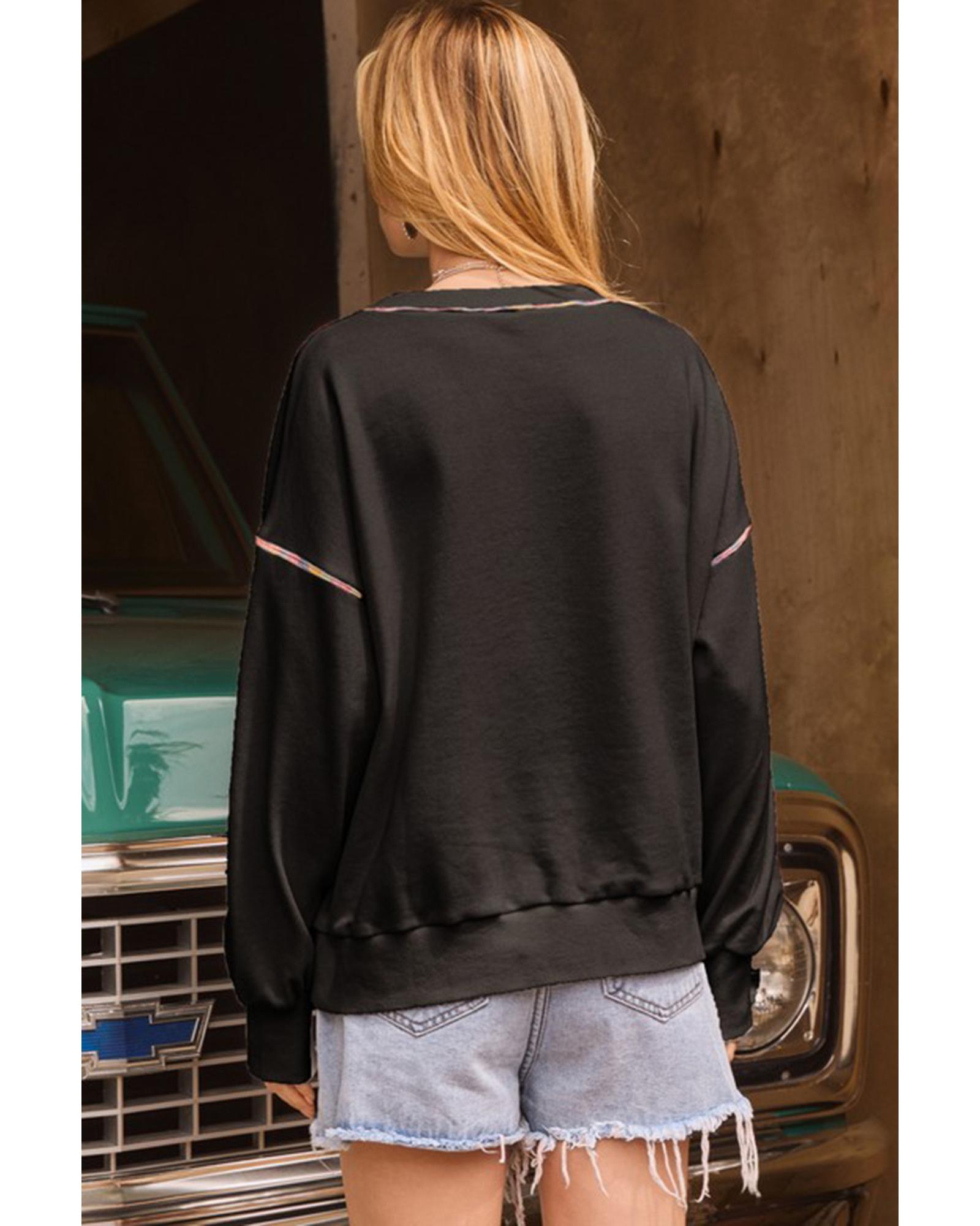 V539-AZEXDC25318463-P2-XL-202508272230-00 Black Sequin Pumpkin Face Graphic Exposed Seam Halloween Sweatshirt - XL - Image 1