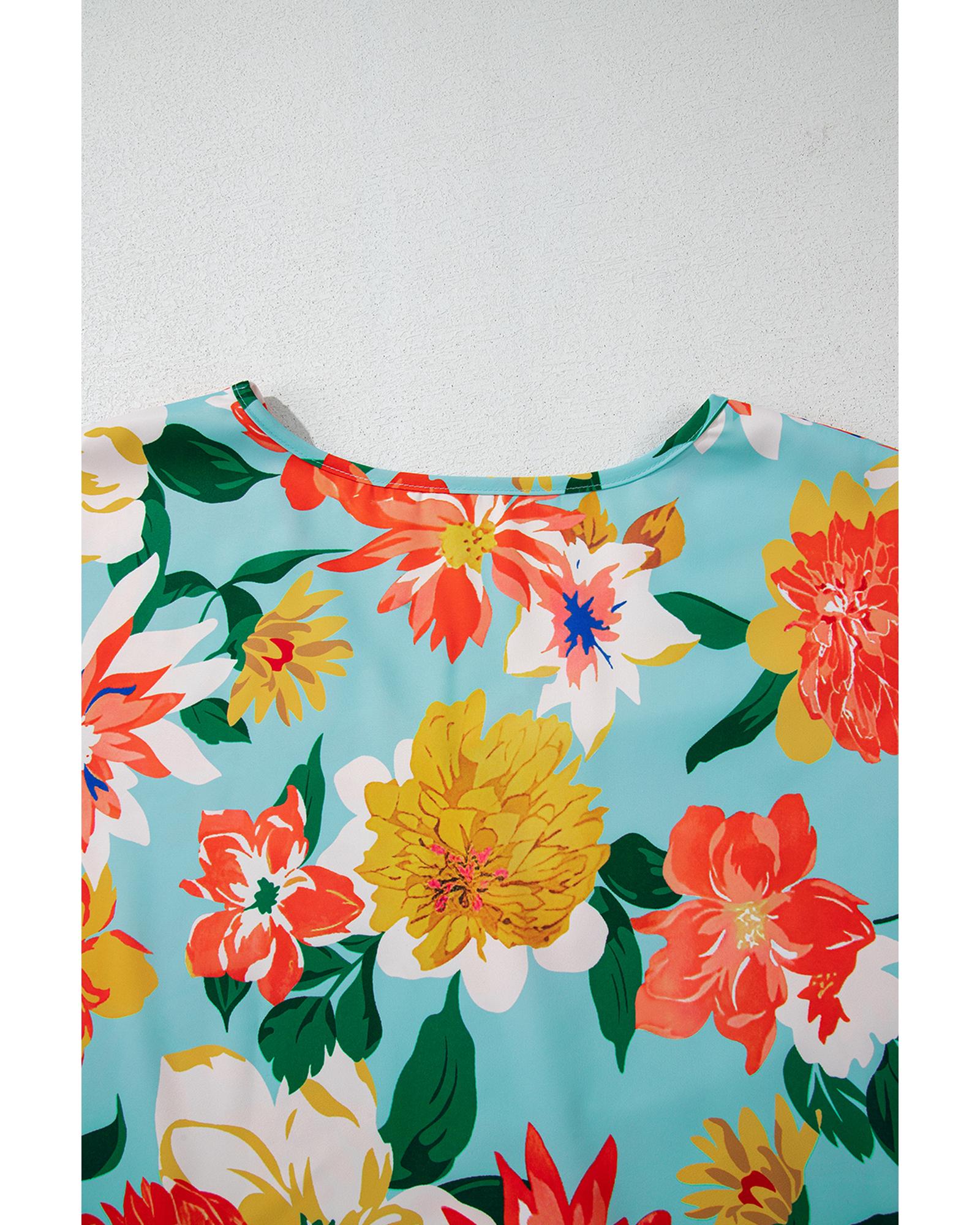 V539-AZEXPL2513171-P420-4X-202508310245-00 Sky Blue Plus Size Floral Print V Neck Batwing Sleeve Blouse - 4X - Image 1