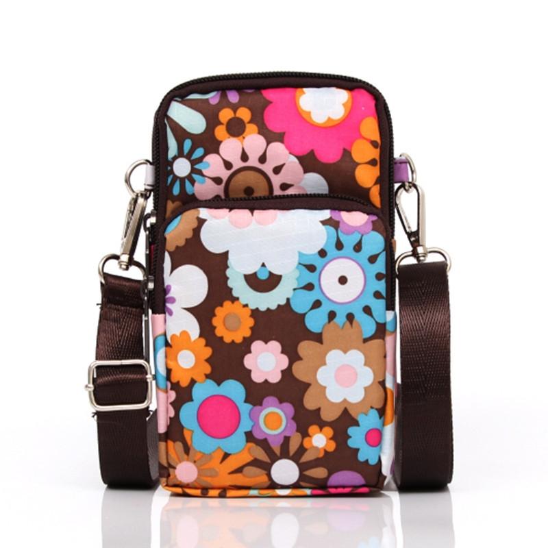 V562-9124774060DBT-202505191612-00 Animal Park Mini Crossbody Phone Wallet With Arm Band - Colourful Flower - Image 1
