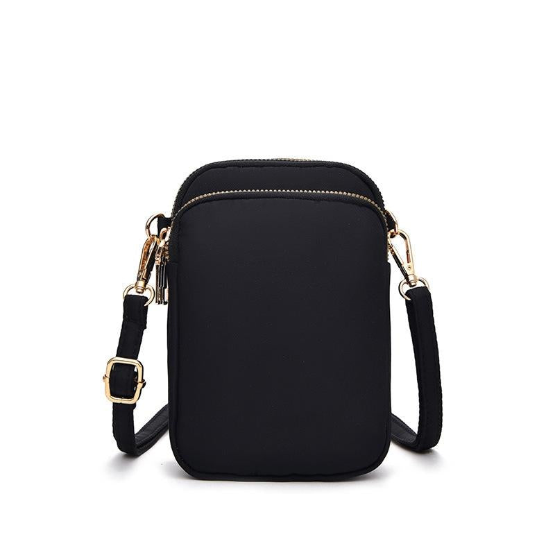 V562-A1082774060DBT-202505191630-00 Women Mini Crossbody Phone Bag With Headphone Hole - Black - Image 1
