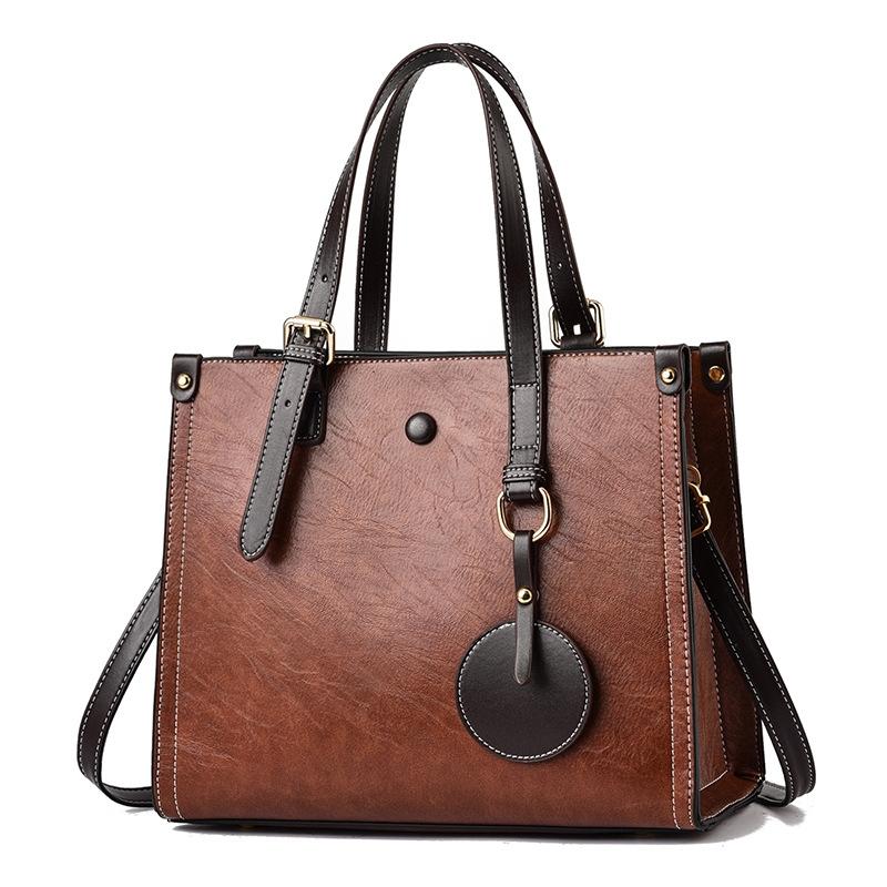 V562-D1050232060DBT-202504251637-00 Vintage Multifunctional Handbag for Women - Caramel Colour - Image 1