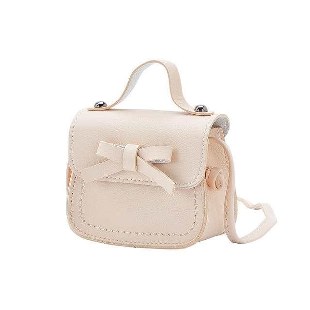 V562-E1064230020DBT-202505191447-00 Mini Bowknot Pu Leather Baby Girls Messenger Bag - Beige - Image 1