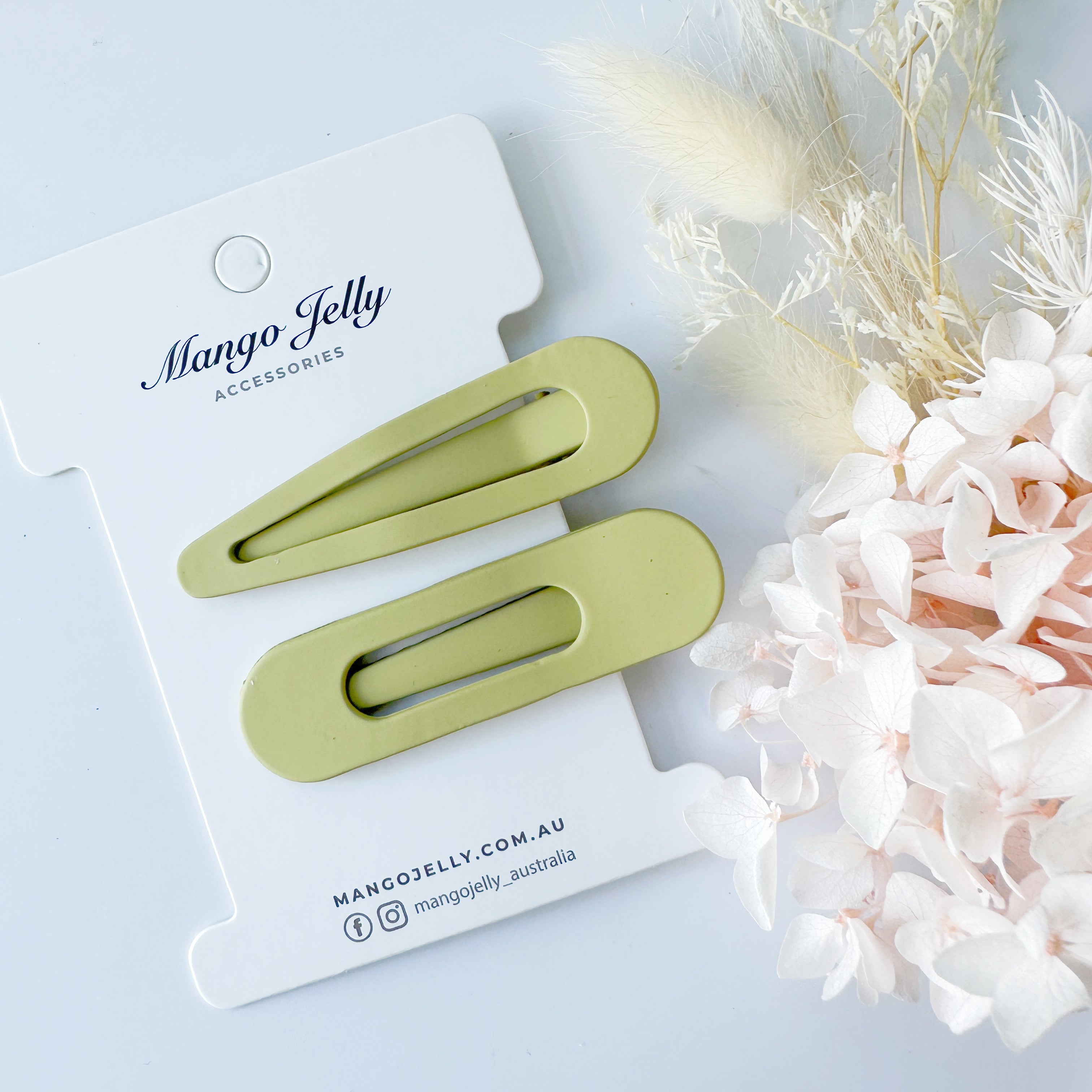 V659-HC-PASTELCOATED-ALI-AVOCADO-1-L-160770-00 MANGO JELLY Large Pastel Coated Hair Clips - Avocado - One Pack - Image 1