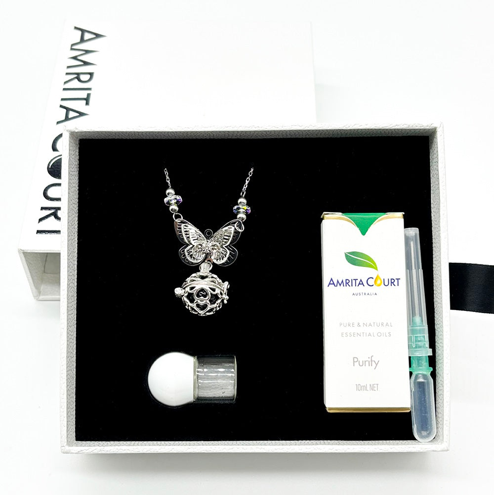 V760-GBAJ-30-195250-08 Gift Box - Butterfly White Gold Aroma Necklace + Purify Oil Blend - Image 1
