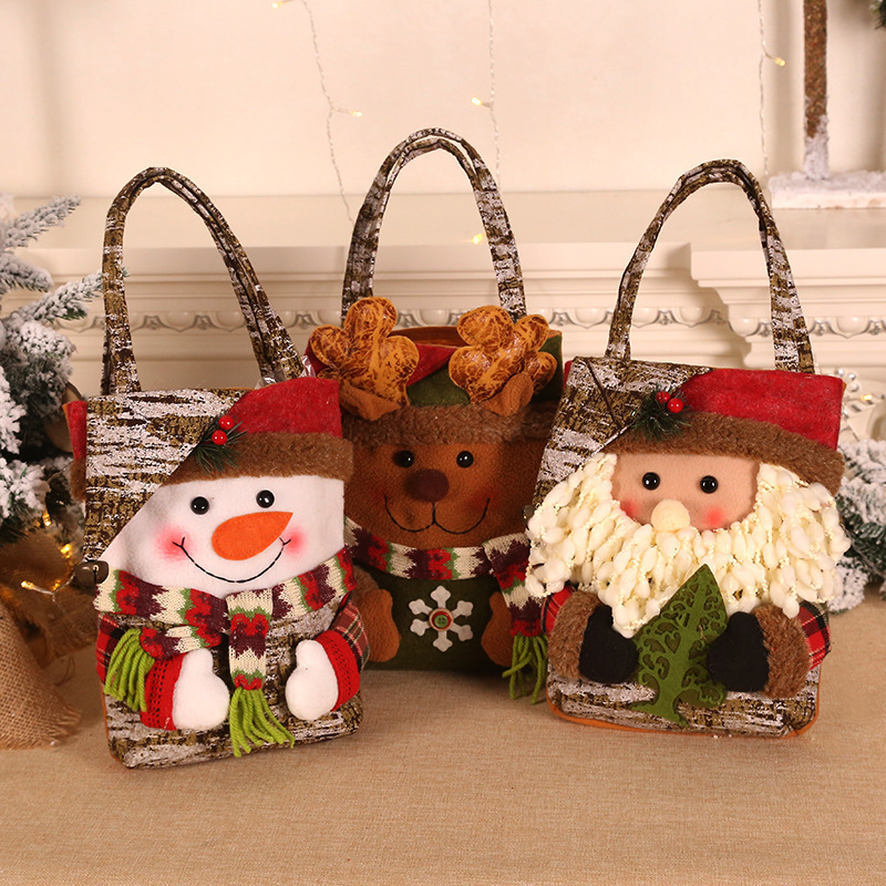 V888-ELOSUNG10491-204672-00 3 PCS Christmas Gift Bags - Santa, Snowman, and Reindeer Design for Holiday Treats and Presents - Image 1
