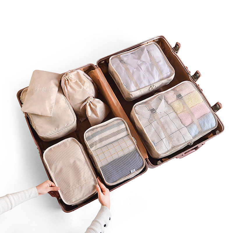 V888-ELOSUNG13360-211391-00 Off White 8-Piece Travel Organizer Set - Packing Bags for Clothes, Shoes, Underwear, and Toiletries with Drawstring and Zip Pouches - Image 1