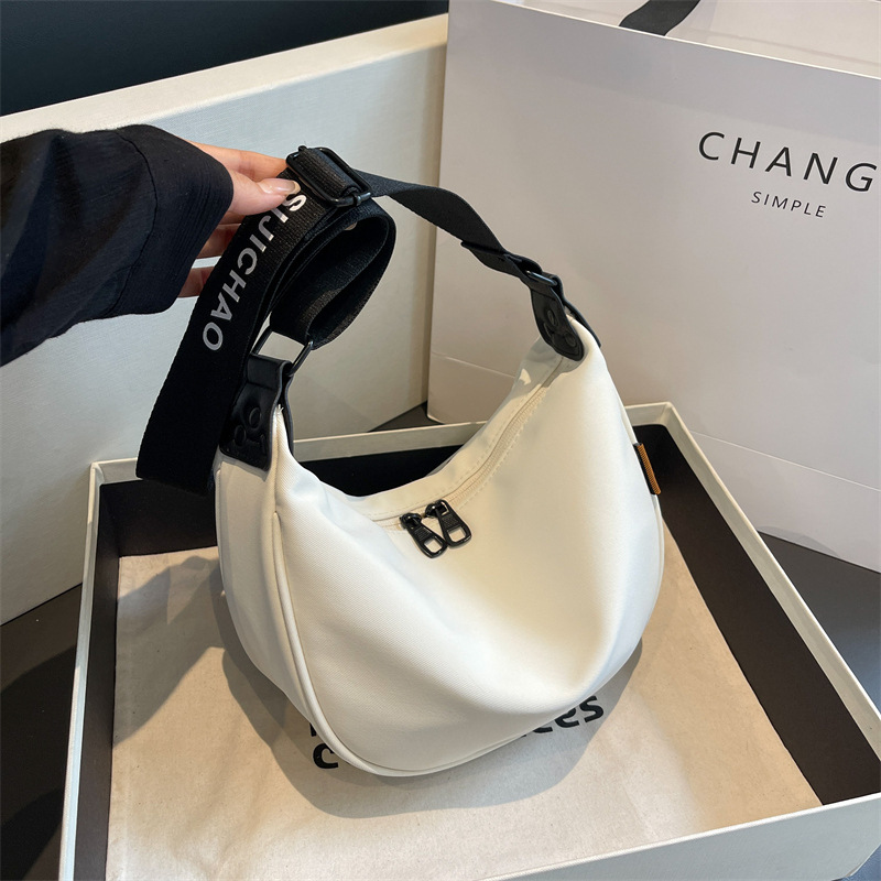 V888-ELOSUNG13971-213876-00 Off White With Black Suspenders Large Capacity Canvas Shoulder Bag - Casual Crossbody Dumpling Bag - Image 1