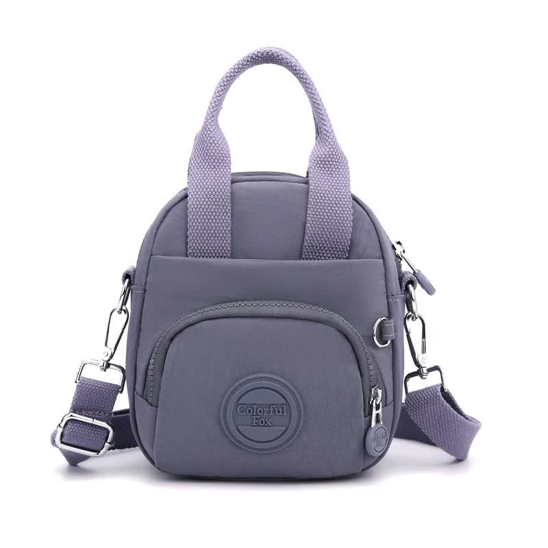V888-ELOSUNG15529-214194-00 Purple Mini Waterproof Nylon Backpack - Lightweight Casual Crossbody Bag - Image 1