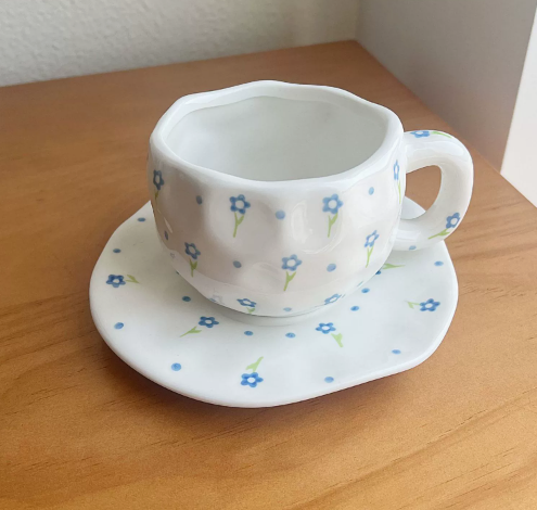 V888-ELOSUNG19234-202502241624-00 White With Small Blue Fowers 300ML Underglaze Hand-Pinched Cup and Saucer Set - Ceramic Coffee Mug Milk Cup Breakfast Set - Image 1