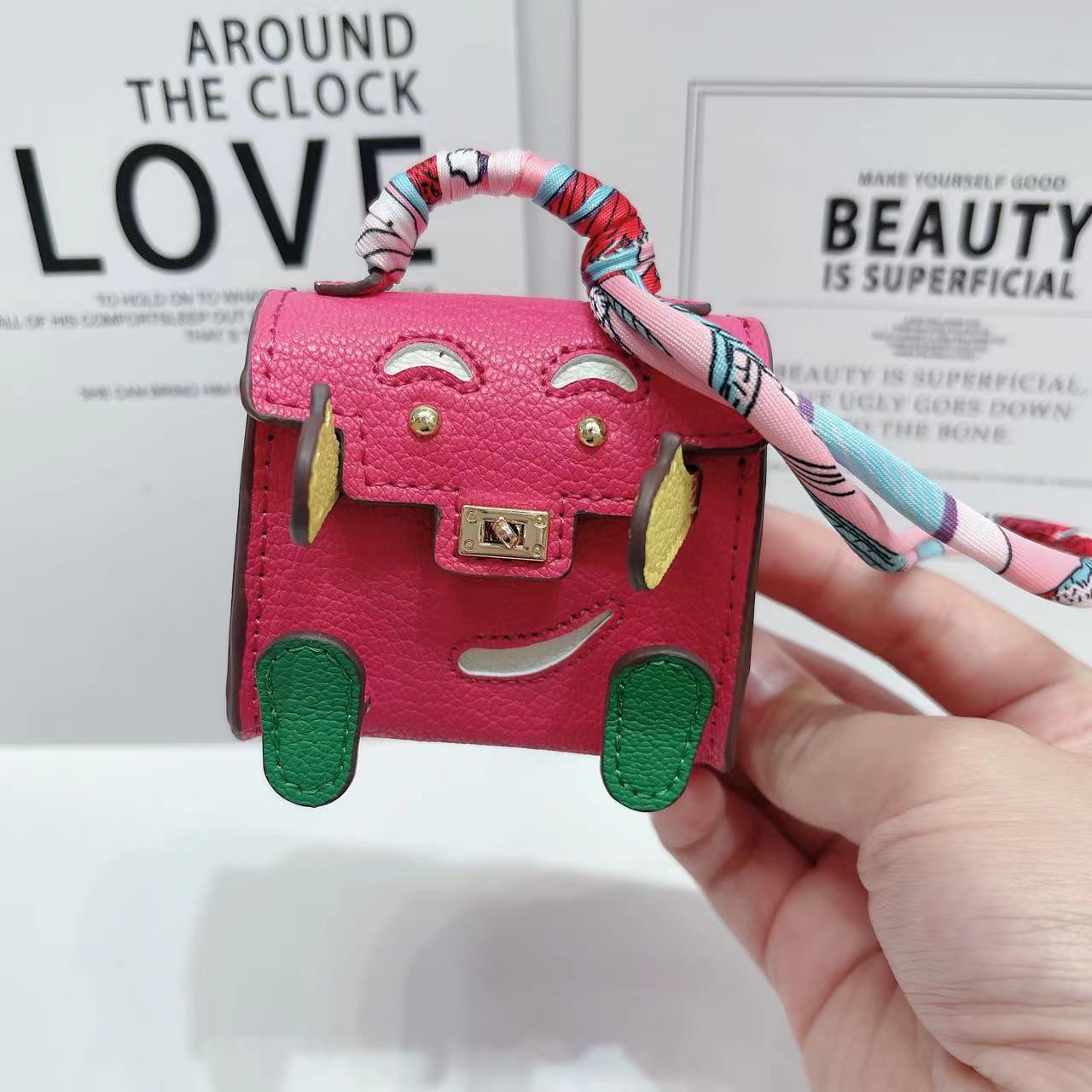 V888-ELOSUNG22107-202503181020-00 Rose Red Mini Bag Earphone Case - Stylish Keychain Pouch for Headphones - Image 1