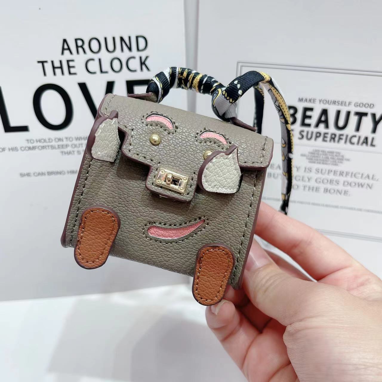 V888-ELOSUNG22116-202503181021-00 Grey Mini Bag Earphone Case - Stylish Keychain Pouch for Headphones - Image 1