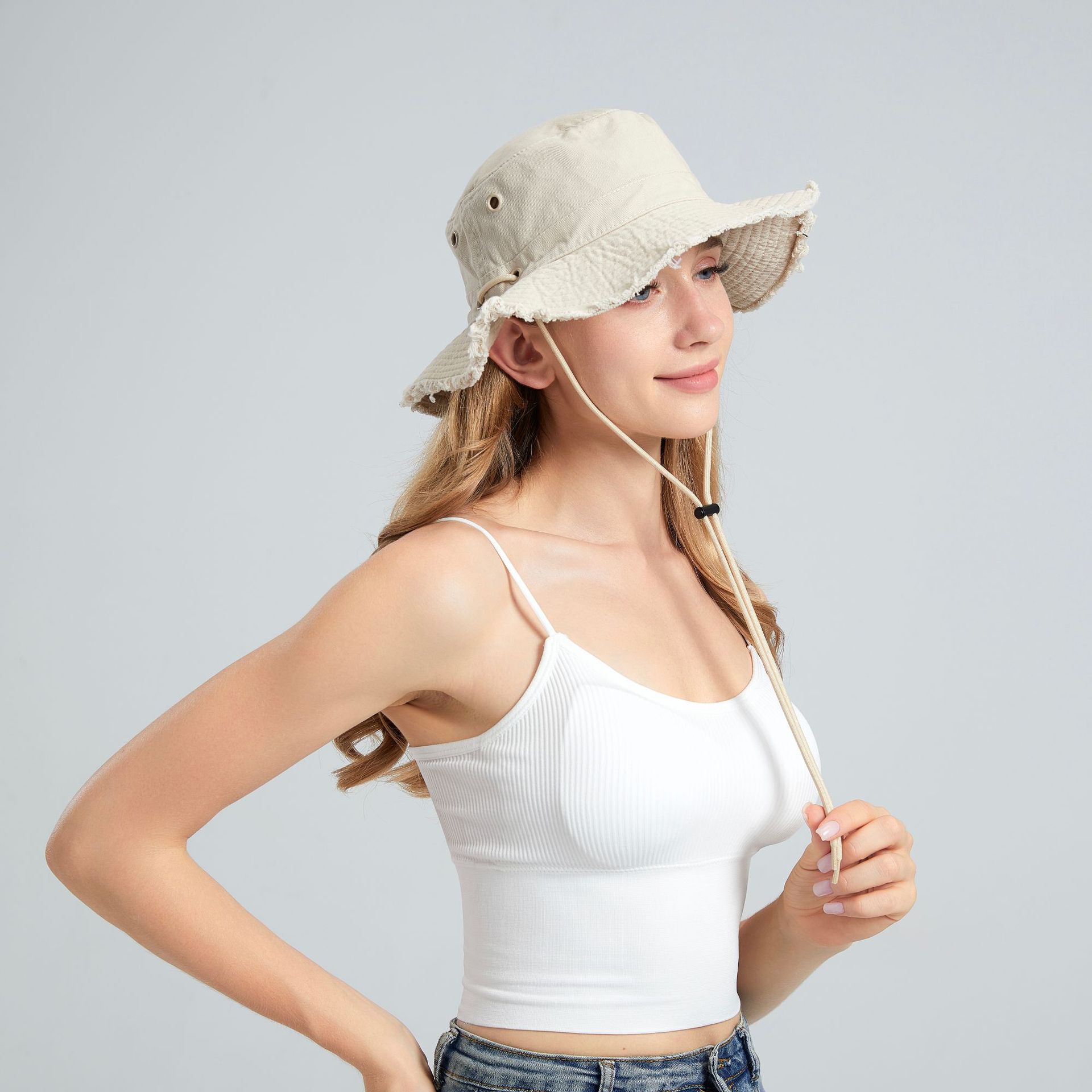 V888-ELOSUNG23649-202504141653-00 Beige Packable Cotton Bucket Hat - Folds into Wearable Pouch | Frayed Edge Sun Hat with Chin Strap - Image 1