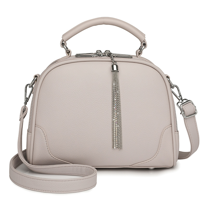 V888-ELOSUNG24392-202504011327-00 Beige Chic Mini Round Crossbody Bag for Women - Elegant Handbag with Tassel Accent - Image 1