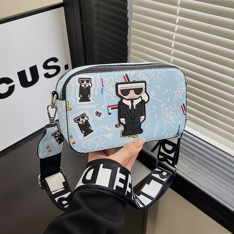 V888-ELOSUNG26778-202505131933-00 Light blue Unique Doodle Print PU Leather Bag - Lightweight Crossbody with Character - Image 1