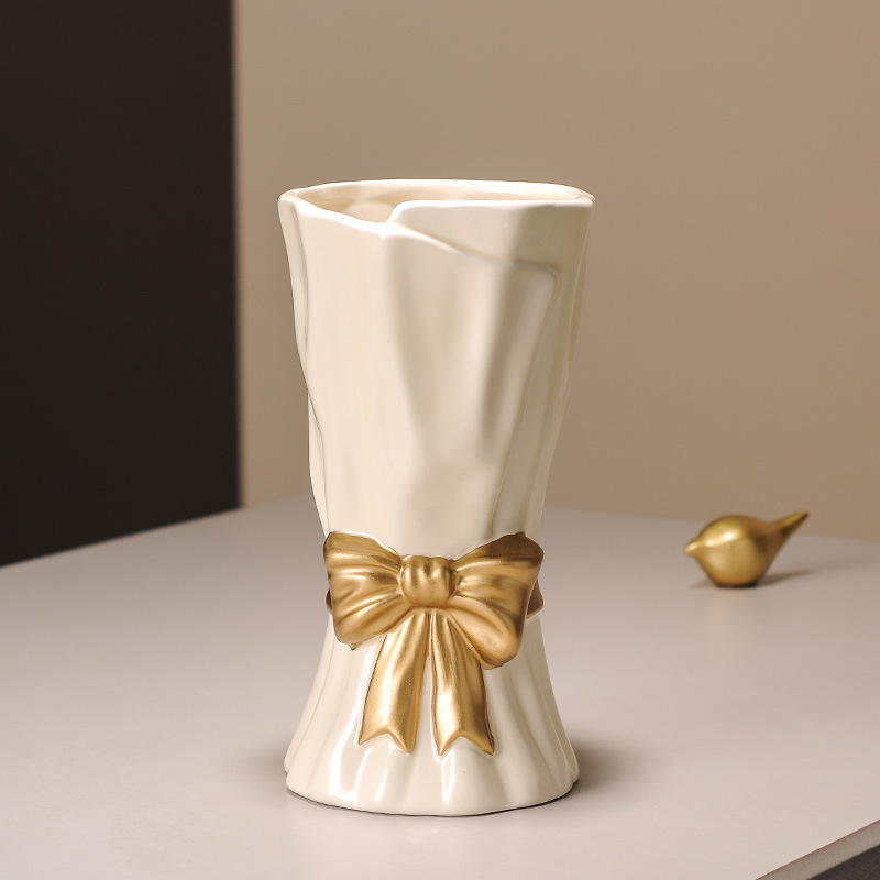 V888-ELOSUNG27750-202505191336-00 Beige Elegant Ceramic Vase with Golden Bow Accent - Textured Relief Flower Holder for Living Room & Dining Table Decor - Image 1