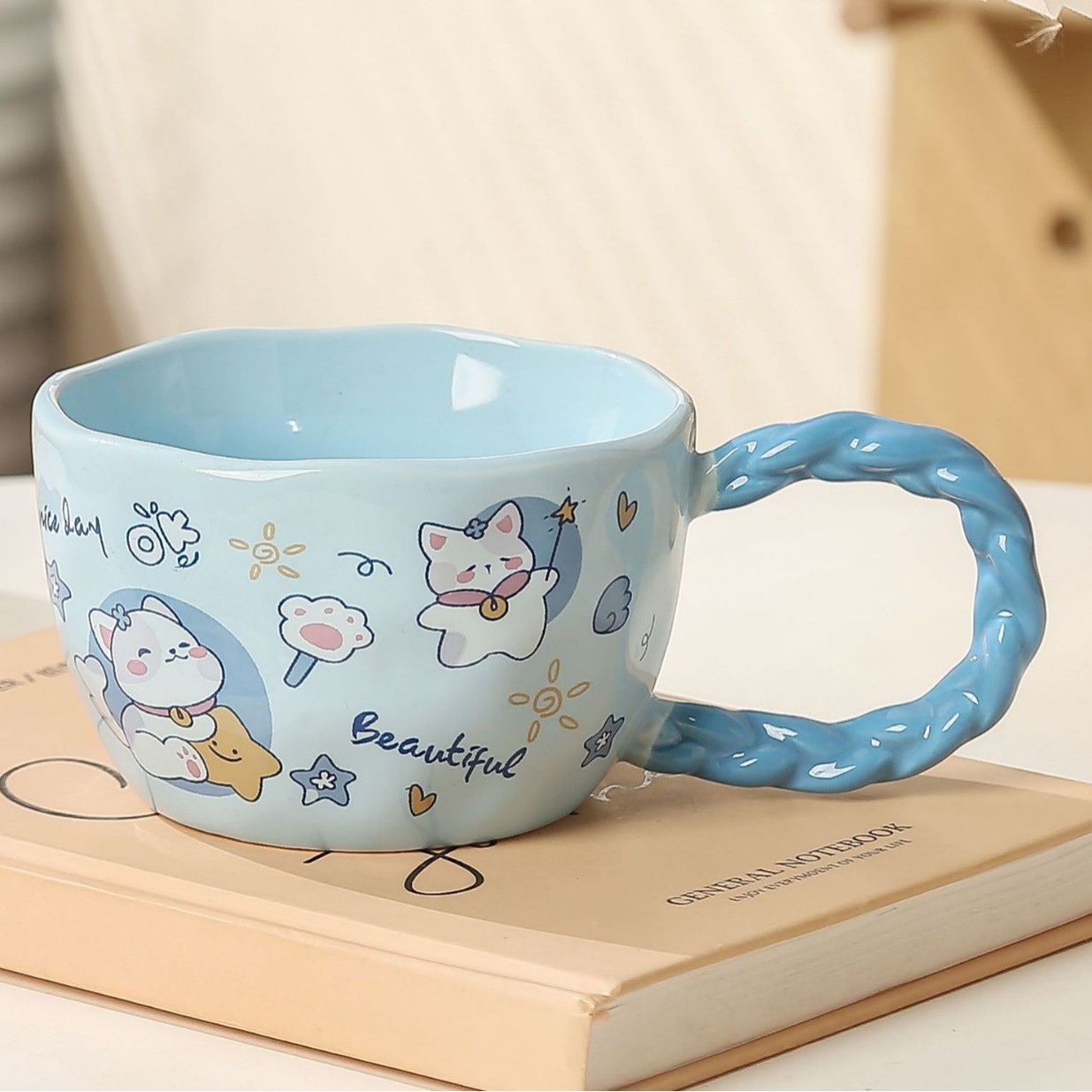 V888-ELOSUNG29118-202505231246-00 Whimsical Cat & Friends Ceramic Mug - 320ml with Unique Twisted Handle (Blue) - Image 1