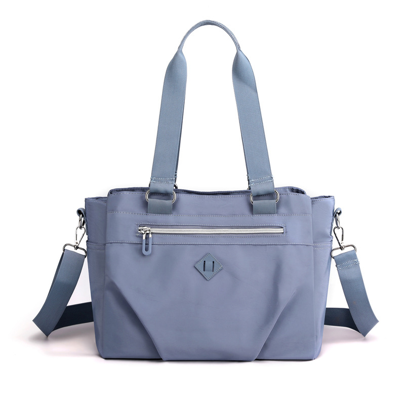 V888-ELOSUNG32010-202505261616-00 Blue Versatile Water-Repellent Nylon Tote Bag - Lightweight Multi-Pocket Shoulder & Crossbody Handbag - Image 1