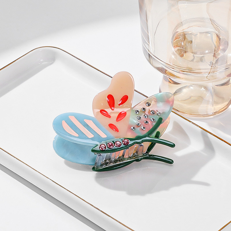 V888-ELOSUNG33224-202506091615-00 Light-blue Stylish 3-Piece Butterfly Acetate Hair Clip Set - Image 1