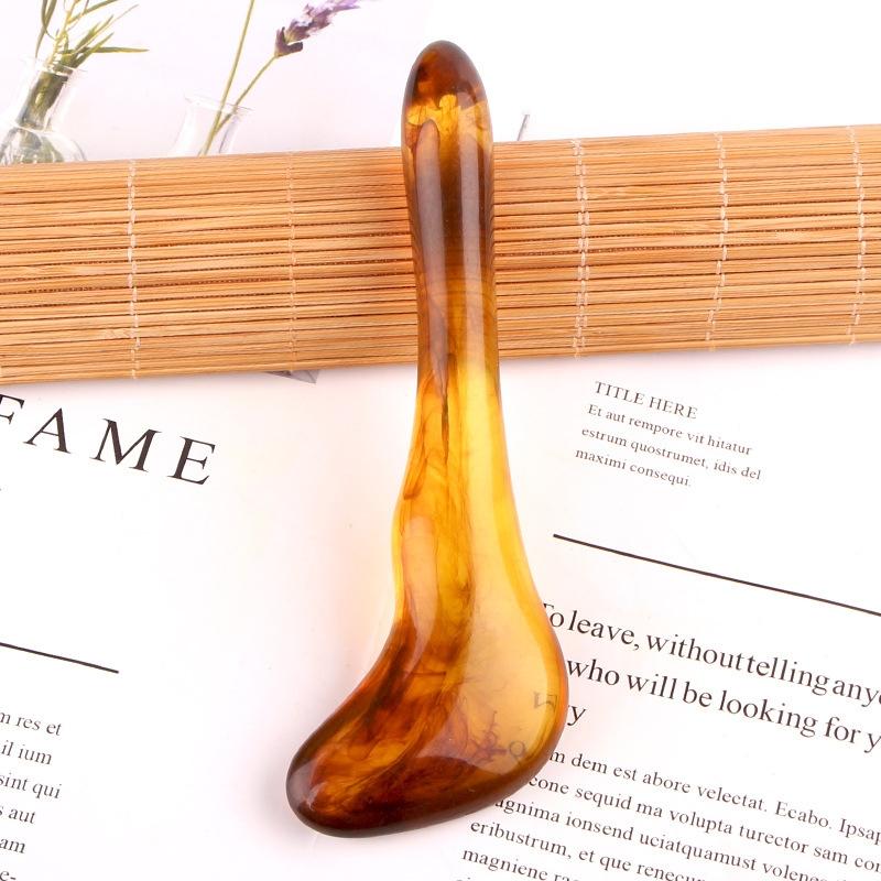 V562-3017291750DBT-202508280506-00 Facial Massage Stick For Relaxation And Acupuncture Amber Colour - Image 1