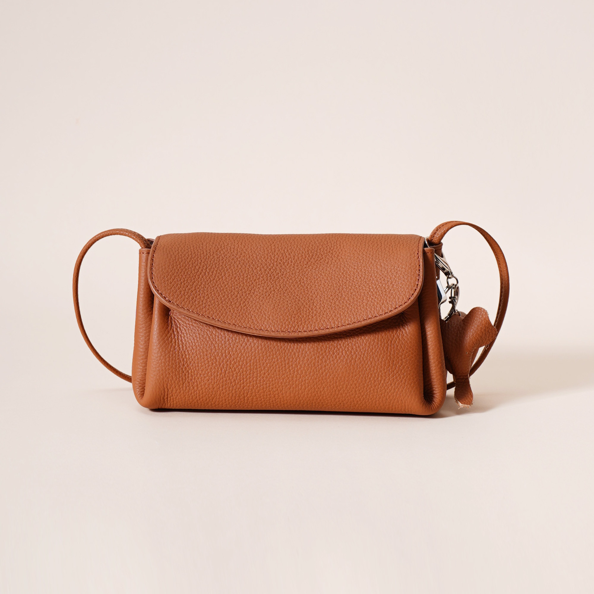 V888-ELOSUNG35965-202509021445-00 Genuine Leather Flap Crossbody Bag with Elephant Charm - Compact & Stylish Shoulder Purse(Golden brown) - Image 1